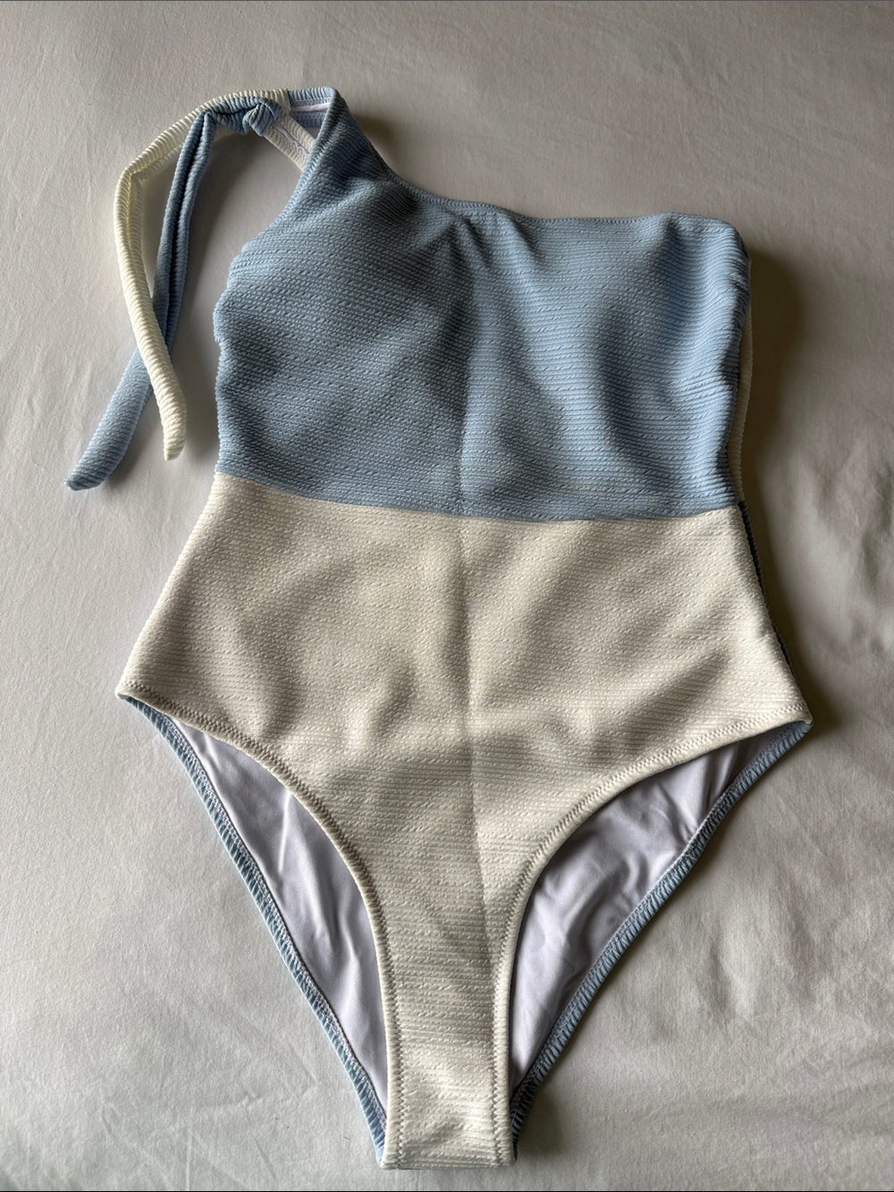 Cupshe Two-Tone One-Shoulder One-Piece Swimsuit in Light Blue and Cream